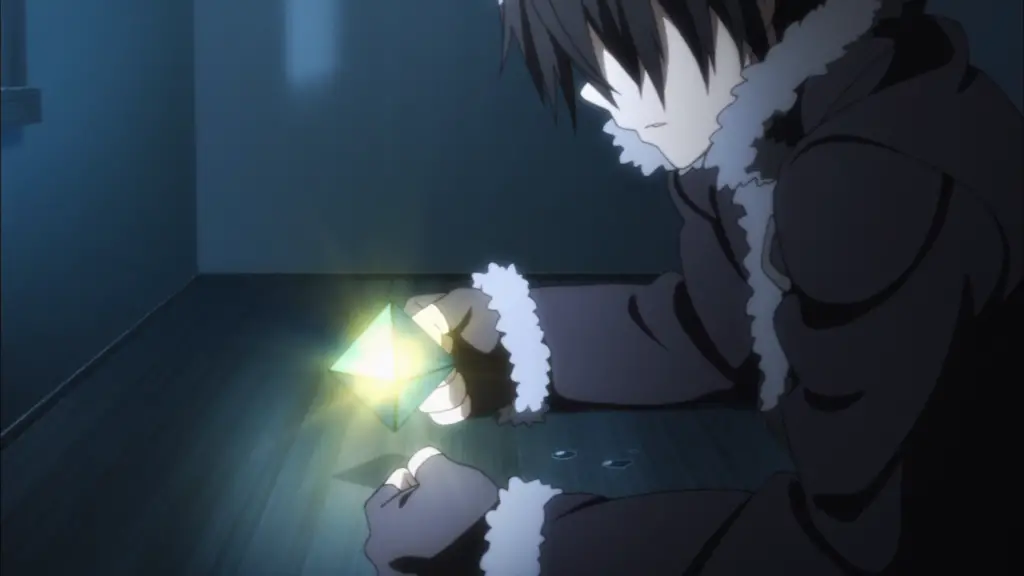 Kirito listening to Sachi's message during the Christmas anime episode of Sword Art Online