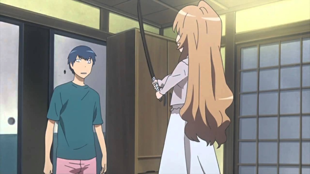 Ryuuji facing Taiga with her wooden katana