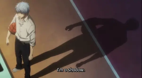 Kuroko standing with a basketball and his shadow behind him